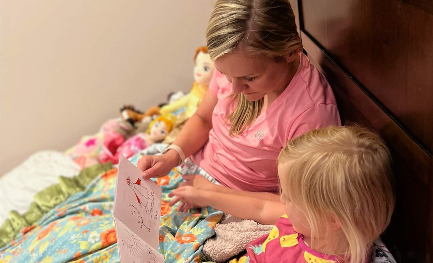 Dr. Hudson reading to daughter