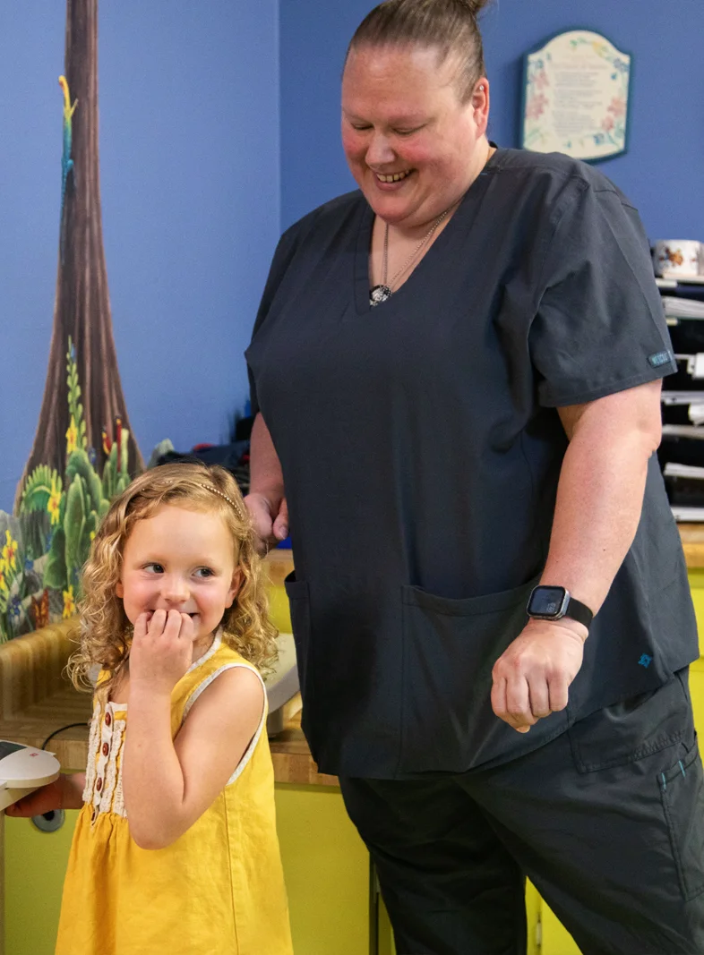 pediatric nurse with child patient