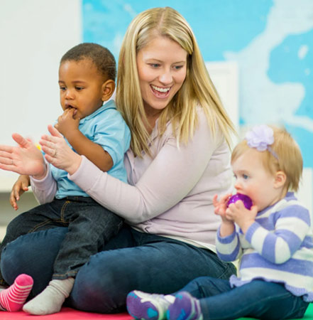 daycare worker with kids